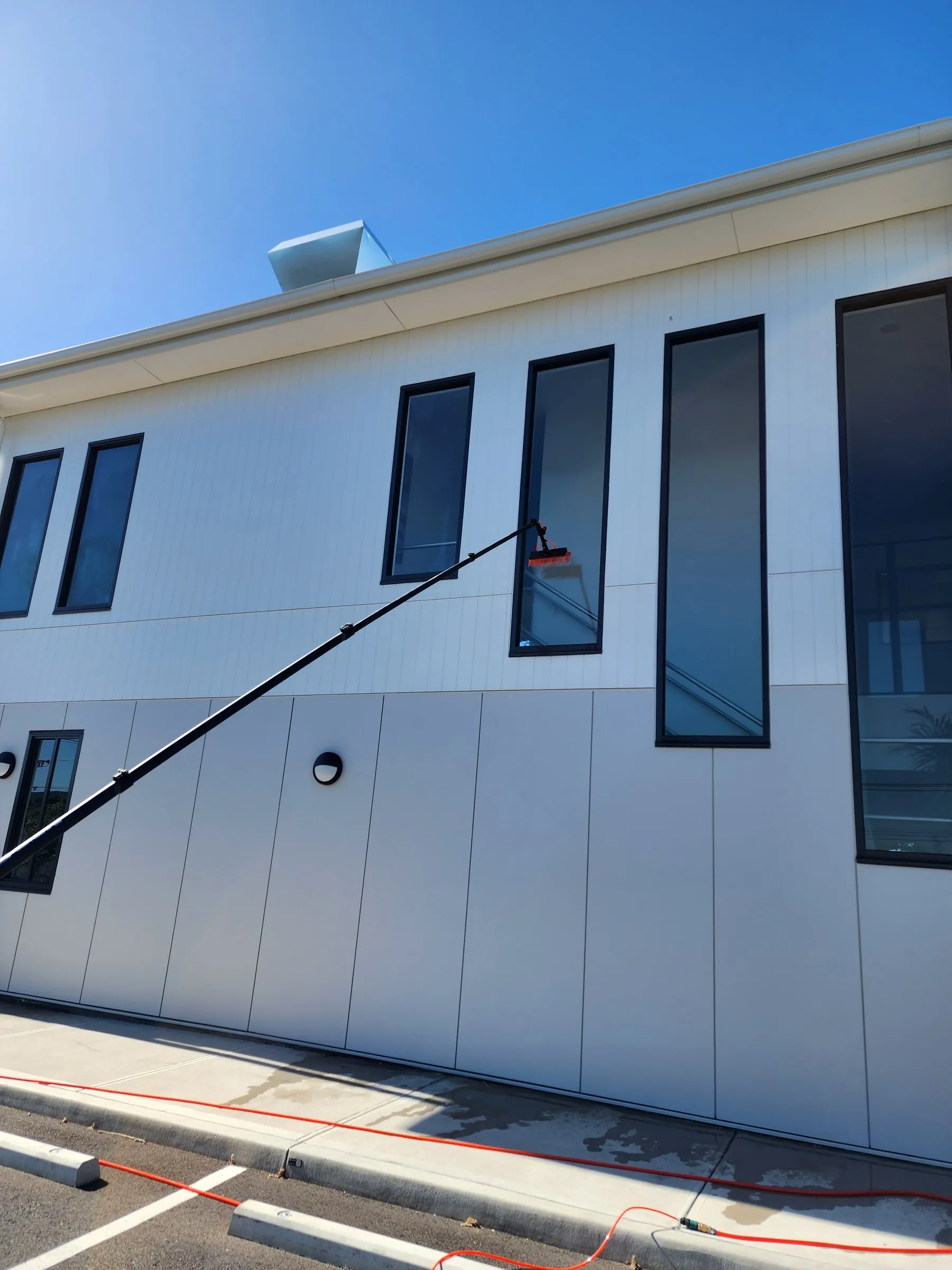 Modern facade, pole-fed glass
