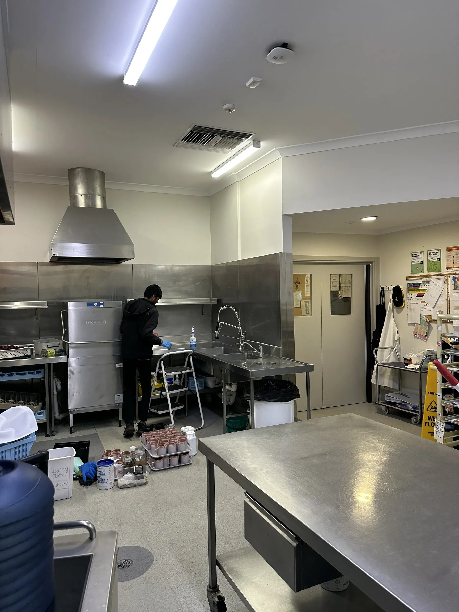 Commercial kitchen deep clean in progress